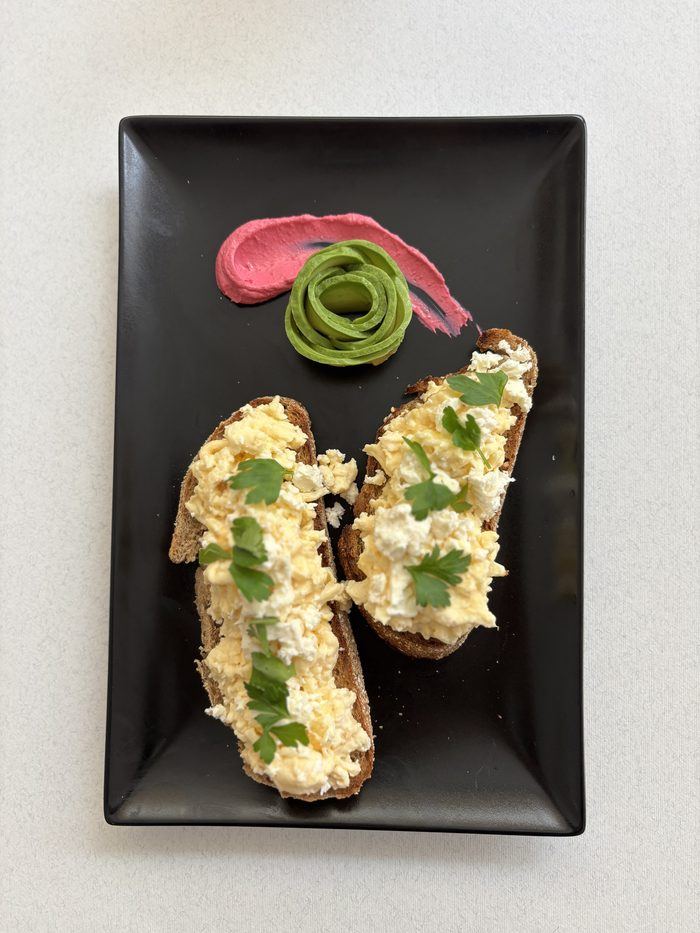 Huevos Locos: scrambled eggs, feta and avocado.